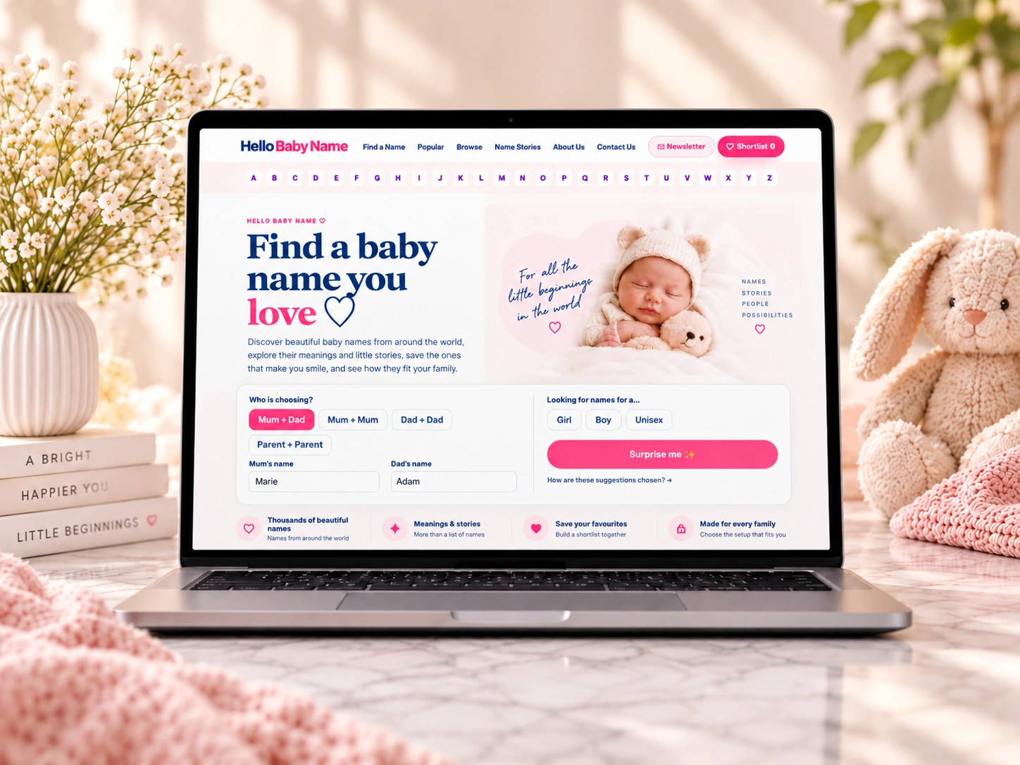 HelloBabyName.com shown on a laptop with Find a baby name you love visible on screen